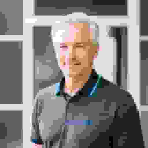 LinkedIn man headshot with dark clothes